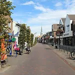 By *