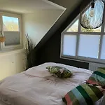 By *